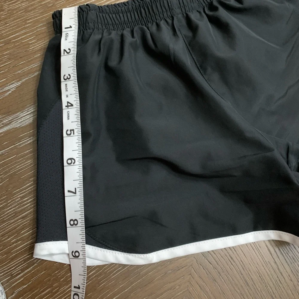 Nike black with white trim athletic shorts Size M